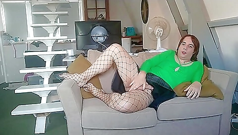 Petite red-haired chick gets naked and masturbates