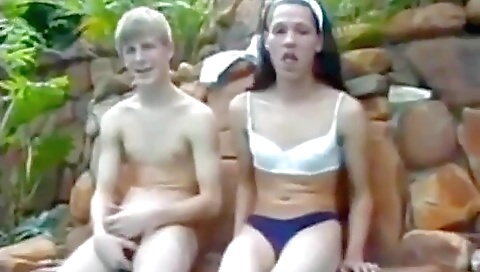 Hot 18-year-old brunette plays a game in the backyard