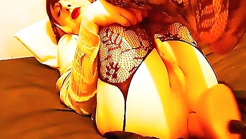 Big dildo fucking the slutty brunette in a white suit