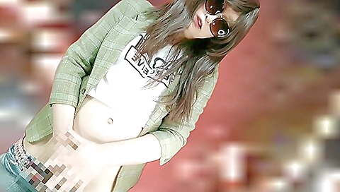 Japanese chick spreads her legs and finger her ass