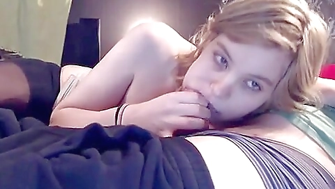 Blondie with a beautiful smile sucks a cock and then her pussy