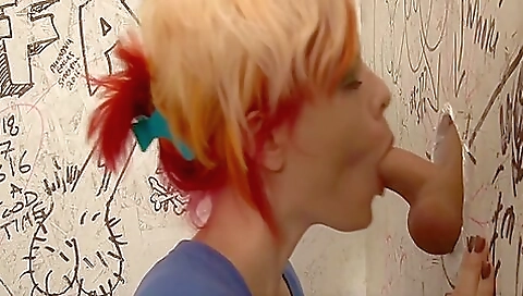 Slutty blonde trans slut fucks stepdad in glory hole