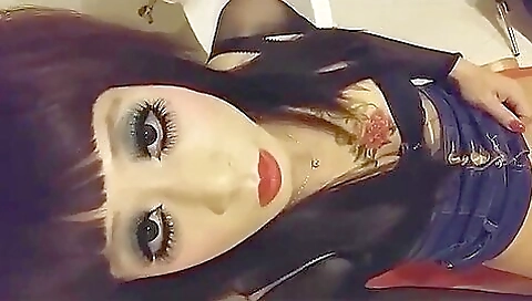 A hot brunette with a tattooed pussy is in bondage sex